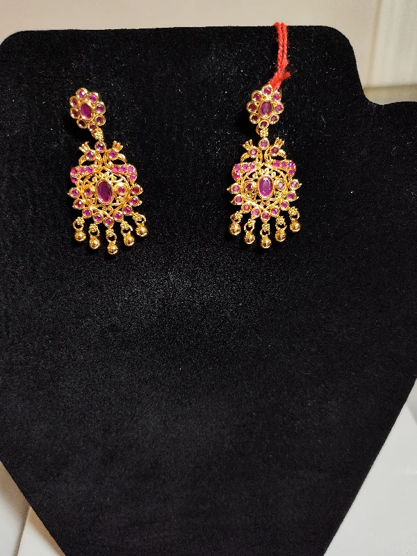 Drop Earrings with Textured Surface -Pleasing Gold Plated Earrings With Red Stones