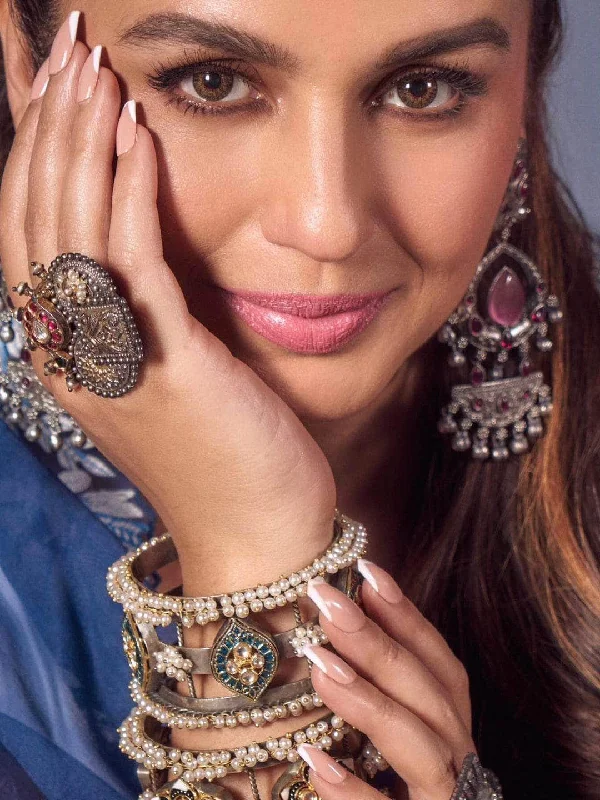 Women’s eternity rings with pave emerald bands -Huma Qureshi In Oxidised Red Stone Rings With Ghungroo