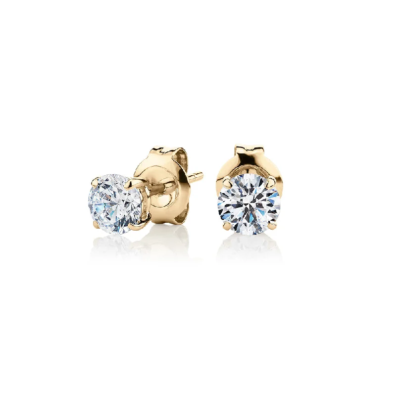 Drop Earrings for Travel Look -Round Brilliant stud earrings with 1 carat* of diamond simulants in 10 carat yellow gold