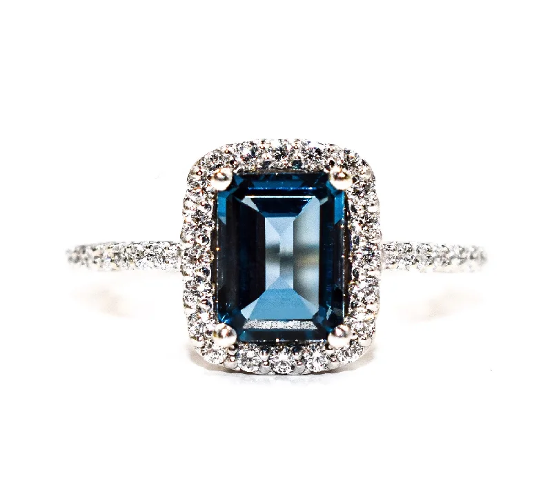 Women’s rings with agate slices for earthiness -Emerald Cut London Blue Topaz Ring