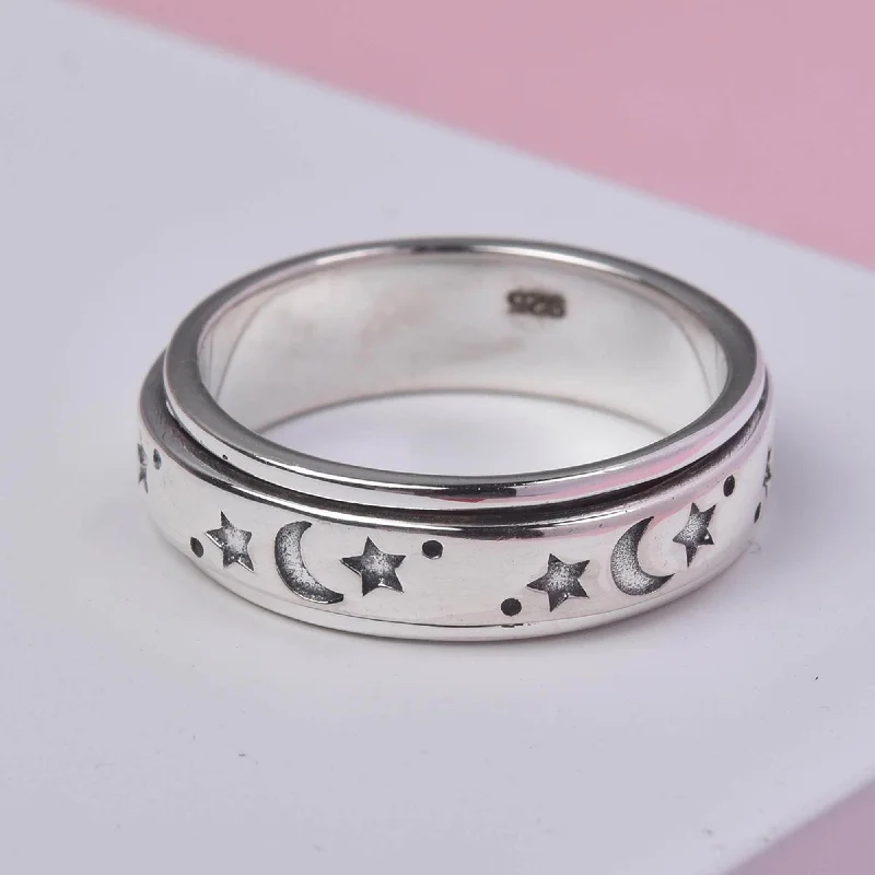 Women’s rings with polished jade for calm -Moon & Stars Spinner Ring