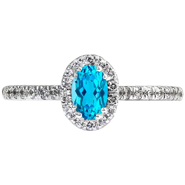 Women’s rings with bezel-set aquamarine gems -Oval London Blue Topaz & Round Diamond Halo Ring