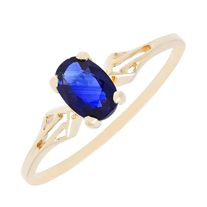 Women’s rings with etched wave band designs -Oval Sapphire Ring in 14kt Yellow Gold