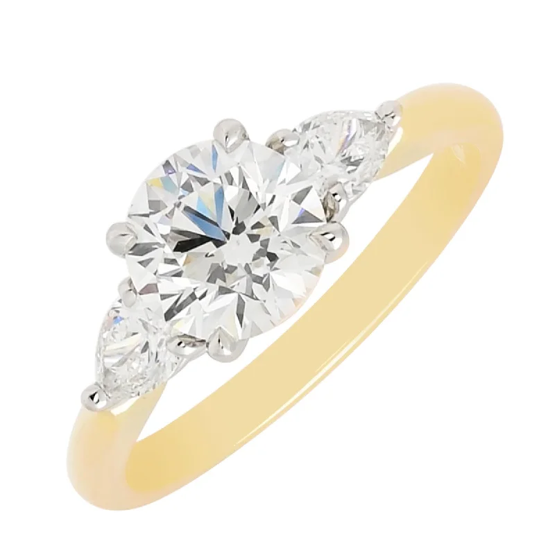 Women’s bold rings with hammered silver bands -Round and Pear Shape Diamond Engagement Ring in 18kt Yellow Gold and Platinum (1 5/8ct tw)