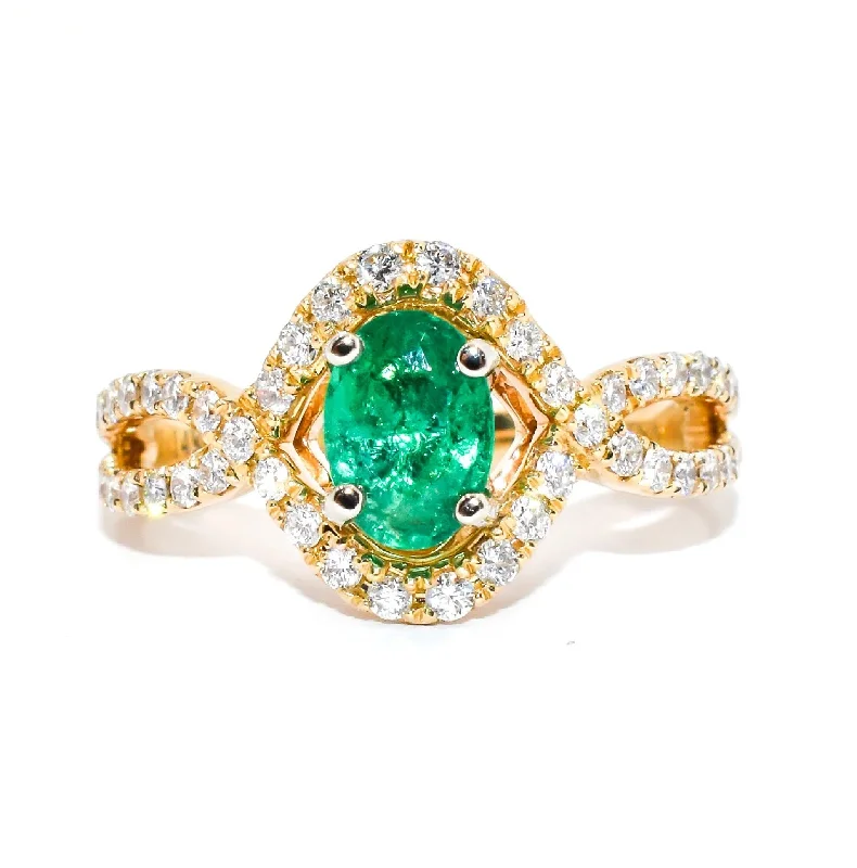 Women’s rings with polished jade for calm -Oval Emerald Diamond Halo Ring