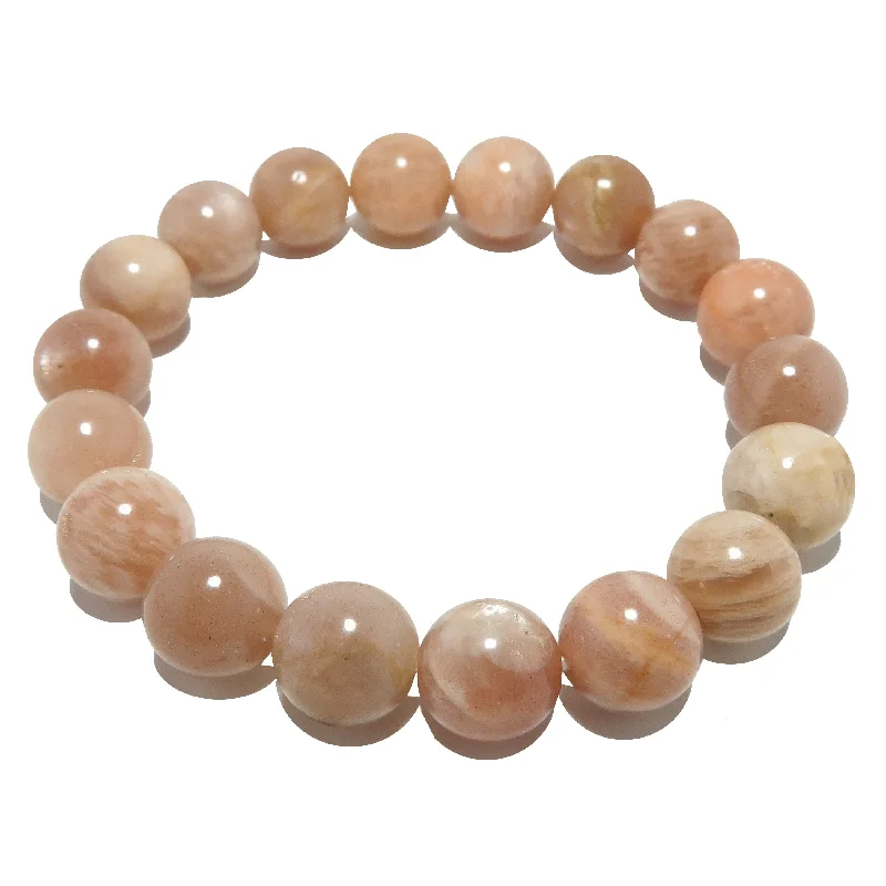 Best bangle bracelets with hammered gold finishes for a textured, rustic feel-Peach Moonstone Bracelet Moon Dance