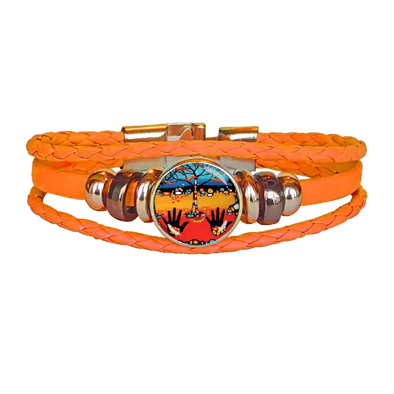 Bangle bracelets with colorful gemstone accents for a fun and vibrant pop of color-"Remember" Leatherette Bracelet design by Native Artist, John Rombough