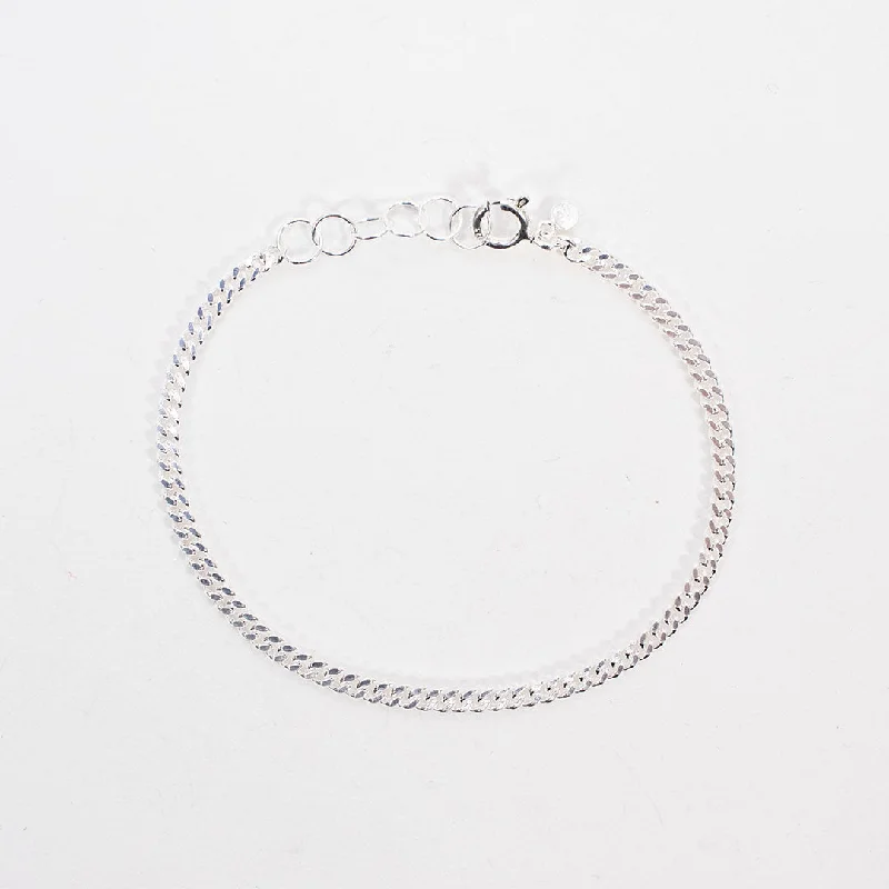 Best bangle bracelets with engraved floral patterns for a delicate and elegant design-Silver Curb Chain Bracelet